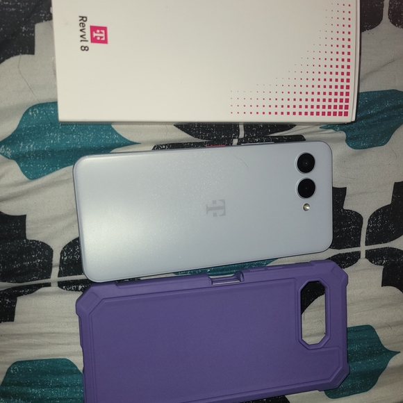 8 White Smartphone with Purple Protective Case